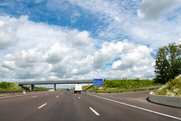 Driving on highway and road signs to Paris and other French cities, different types or roads in ...