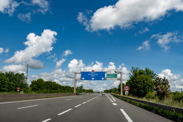 Driving on highway and road signs to Paris and other French cities, different types or roads in ...