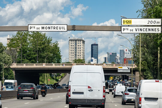 Driving in heavy traffic on ring road of capital of France, traffic jam problems in Paris