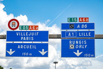 Driving on highway and road signs to Paris and other French cities, different types or roads in ...