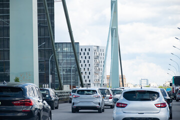 Fototapeta premium Driving in heavy traffic on ring road of capital of France, traffic jam problems in Paris