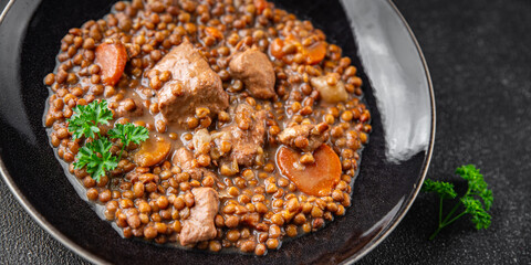 lentils with meat beef or pork fresh cooking appetizer meal food snack on the table copy space food background rustic