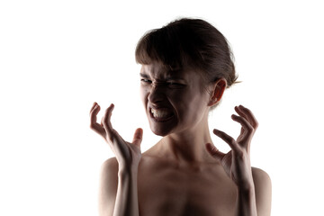 Dramatic portrait of a young woman expressing strong emotion against a white background