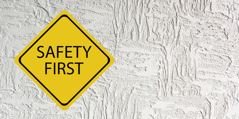Safety first symbols, work safety, caution work hazards, danger surveillance, zero accident concept. Wooden cubes with smart grey background. Employees safety awareness at workplace. Safety banner.