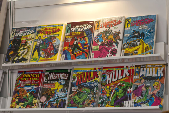 Action comic books - American Comic book with Superman, Werewolf  and Hulk , superhero characters on the shelf. 