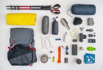 Ultralight outdoor gear. Equipment for hiking. Light weight backpacking, traveling. Top view.