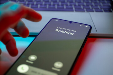 Phishing call concept on mobile phone. Person get phish call alert. Phone call from unknown number...