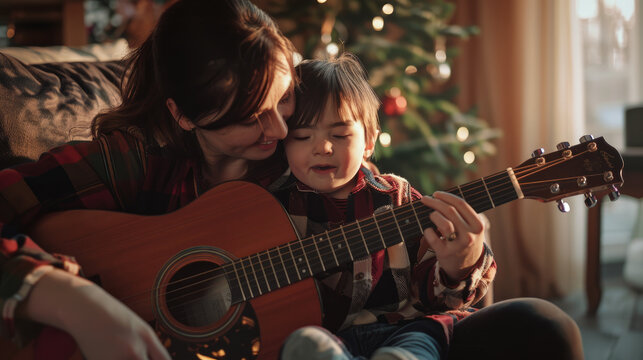 Single mother with down syndrome child at home, playing guitar.