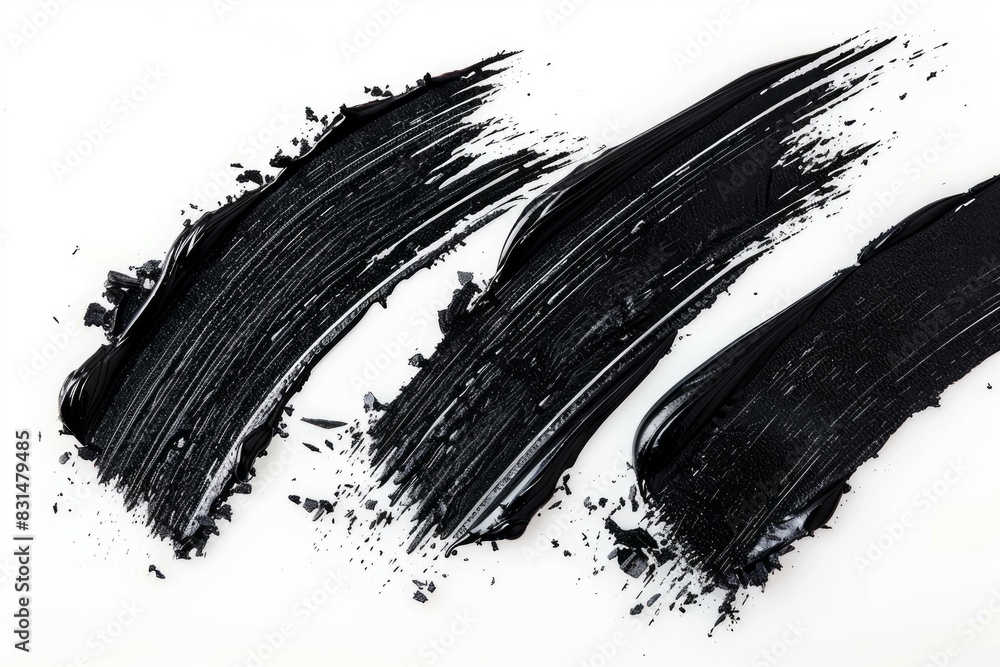 Poster abstract image of smeared black paint creating textured brush strokes isolated on a white backdrop