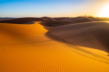 Sand dunes at Erg Chebbi Sahara desert at sunset near Merzouga town, Morocco, North Africa