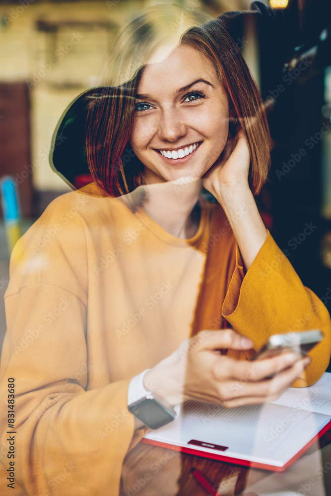 Aufkleber half length portrait of happy beautiful blogger received good comments from followers under last pub