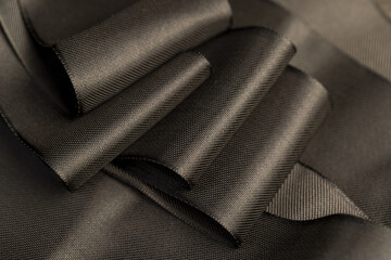 Obraz premium shiny beautiful black satin ribbon
