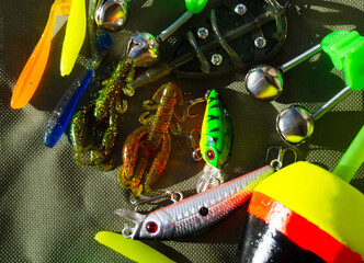 Fishing gear on a tarpaulin background. Background for a fishing theme.