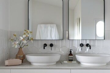 Modern bathroom featuring scallop edge mirrors and fixtures
