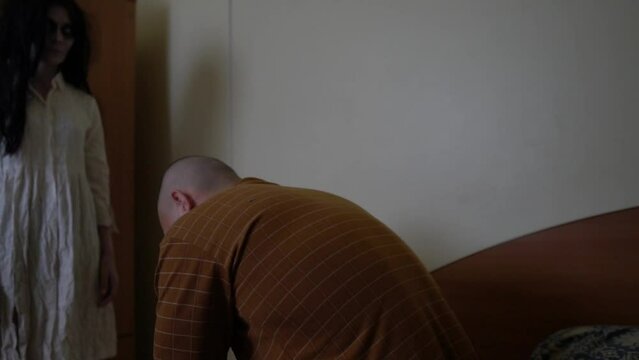The vengeful ghost of his girlfriend follows a young man into his apartment,A ferocious female ghost stalks people.