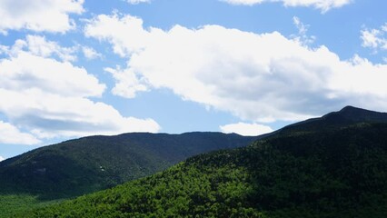 Breathtaking Timelapse in the Adirondack Mountains with Spring Foliage and visible cloud cover in Lake Placid, New York