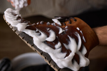 Leather Boot Cleaning with Foam, part of shoe maintenance and caring for leather products