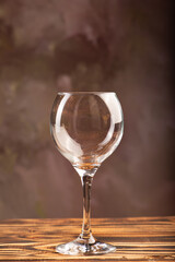Beautiful crystal glass on rustic wood, selective focus.