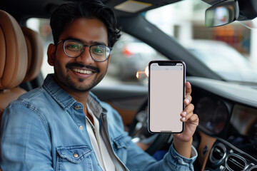 Man Sitting in Car Holding up Cell Phone