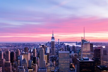 Cityscape skyline panorama at sunset with skyscrapers