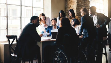 Business group of people working at team meeting. Multiethnic colleagues inside bank workplace