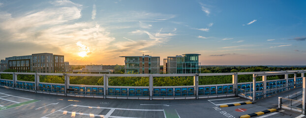 Sunset skyline panorama of Milton Keynes rooftops. England 