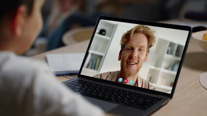 Online teacher videocalling kid online closeup. Smiling father talking web cam