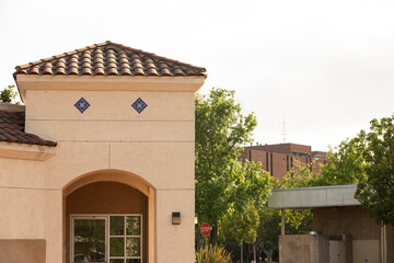 Afternoon sun shines on the buildings of downtown Paramount, California, USA.
