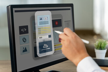 Creative web content design studio with flying website page layout seo technology businessman hand design on laptop designs for mobile app