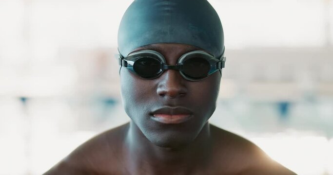 Face, swimmer and black man with goggles, swimming cap or prepare for morning workout. Sports, portrait and hands of athlete person for performance training, water competition or confidence in race