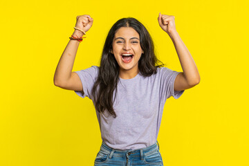 Happy joyful Indian woman celebrating success victory, winning birthday, lottery jackpot goal...