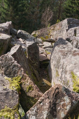 Rock formation at the forest in the Vosges Mountains on a sunny winter day, Alsace, France