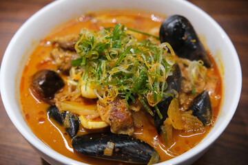 Korean noodle soup with spicy seafood (Jjamppong) close up. Korean food