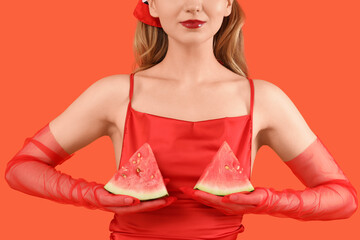 Young woman with slices of fresh watermelon on red background, closeup
