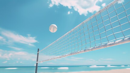 Beach volleyball net and ball on a sunny day with blue sky and ocean background, capturing the...