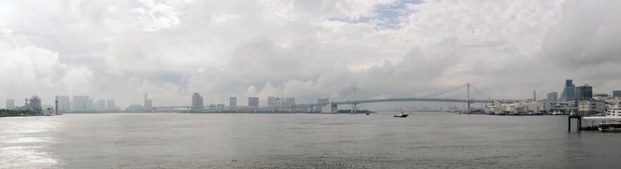 Obraz premium Rainbow Bridge and Tokyo bay panorama with Odaiba island
