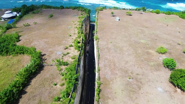 Aerial view of Tanah Barak cliffs, A must-visit viral hidden gem tourist destinantion in South Kuta, Bali, Indonesia