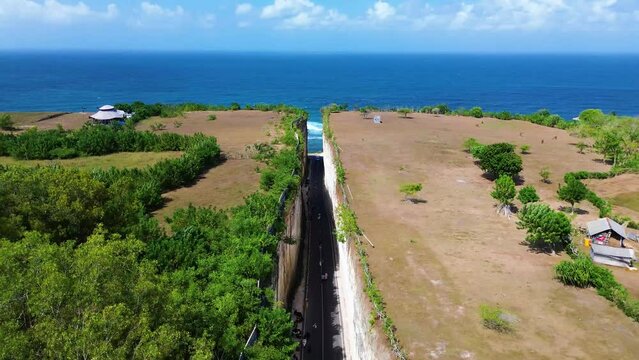Aerial view of Tanah Barak cliffs, A must-visit viral hidden gem tourist destinantion in South Kuta, Bali, Indonesia