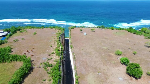 Aerial view of Tanah Barak cliffs, A must-visit viral hidden gem tourist destinantion in South Kuta, Bali, Indonesia