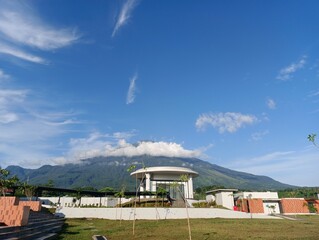 morning atmosphere in the mountains of Indonesia. Building at the foot of the mountain