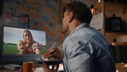 Obraz premium Father calling smiling family by web cam closeup. Woman girl waving in computer