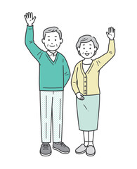 片手を上げて手を振る高齢男女の者夫婦