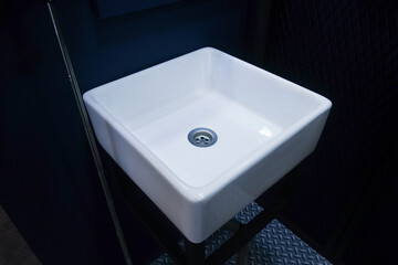 side view of a square white sink