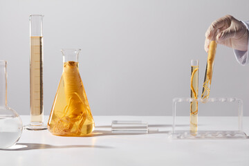 Laboratory concept on white background with ginseng ingredient, which as a rare herb and has many...