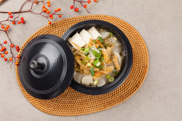  Soup made by tearing dried dried pollack into small pieces, adding green onions, and beating an egg.