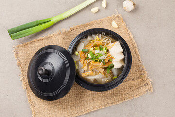  Soup made by tearing dried dried pollack into small pieces, adding green onions, and beating an egg.