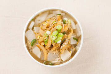  Soup made by tearing dried dried pollack into small pieces, adding green onions, and beating an egg.