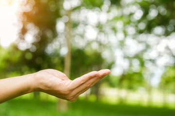 Technology, hand holding with environment Icons over the Network connection on green background.