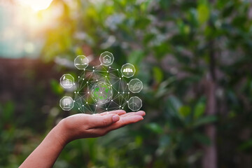 Technology, hand holding with environment Icons over the Network connection on green background.