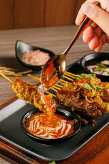 A big dinner party with a small group of friends. From many nationalities come to celebrate at this restaurant.